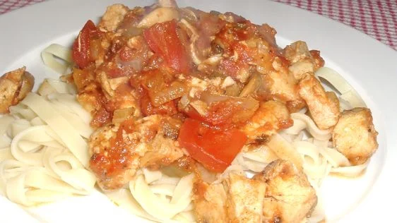 Halal Chicken Salsa Pasta plated and ready to serve - Spicy, garlicky comfort food