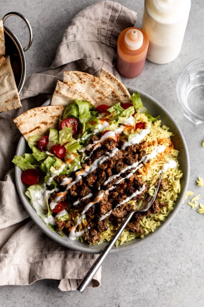 Halal Lamb Over Rice plated NYC street cart style - Halal recipe