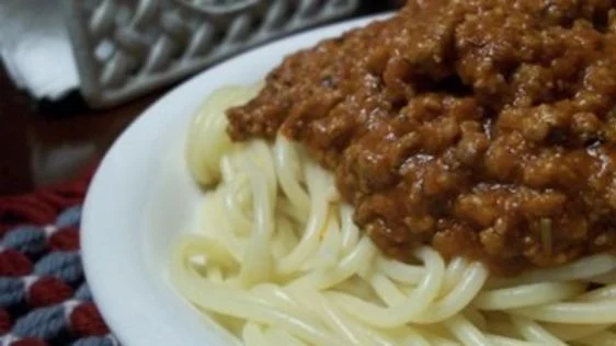Halal Leftovers Spaghetti Sauce served over pasta - Halal recipe